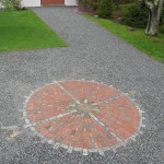 brick and cobble stone compass
